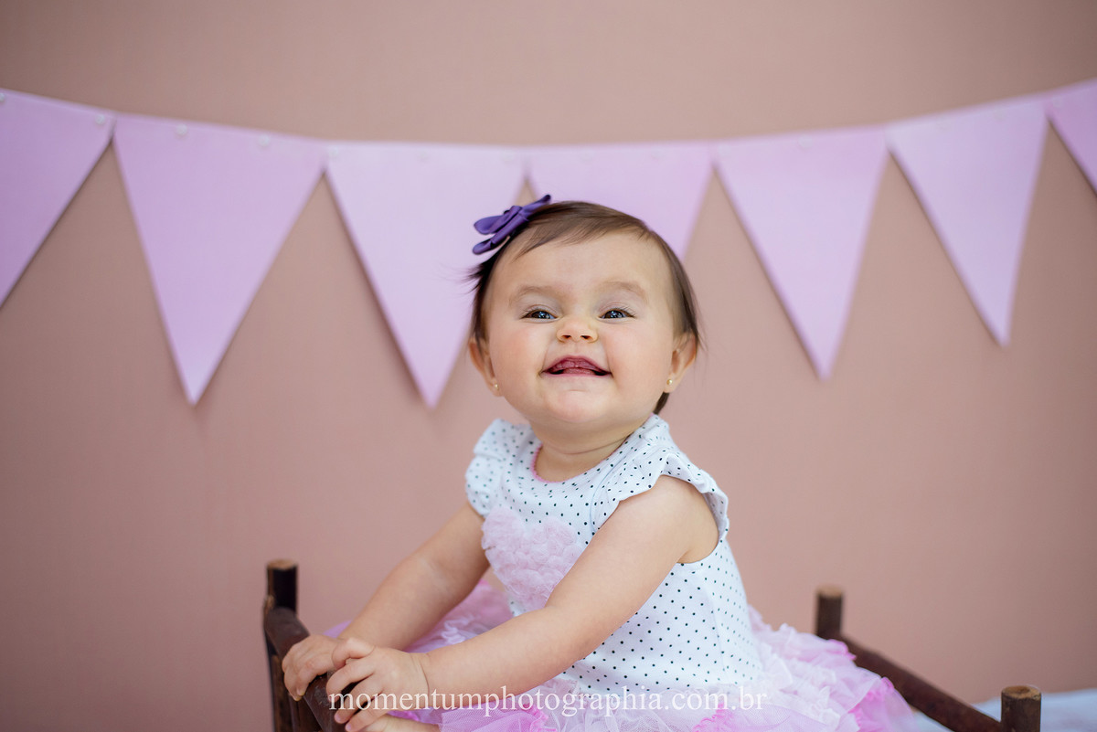 foto tirada por momentum photographia aniversario ensaio infantil em petropolis rj estudio 10 meses