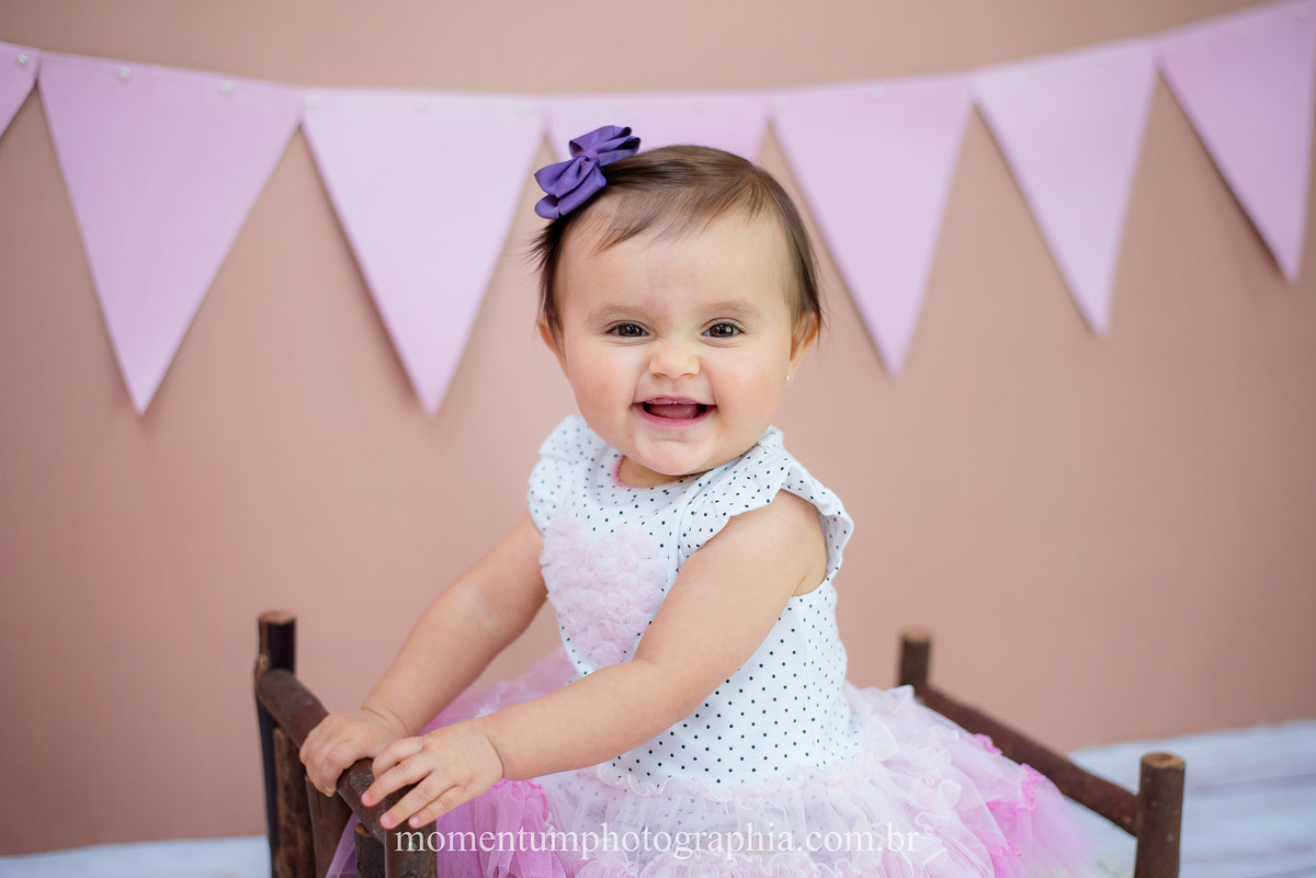 foto tirada por momentum photographia aniversario ensaio infantil em petropolis rj estudio 10 meses