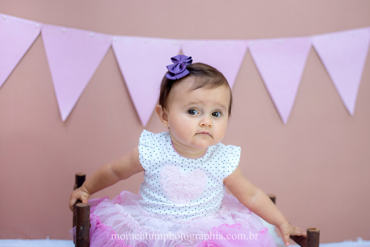 foto tirada por momentum photographia aniversario ensaio infantil em petropolis rj estudio 10 meses
