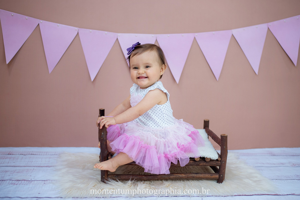 foto tirada por momentum photographia aniversario ensaio infantil em petropolis rj estudio 10 meses