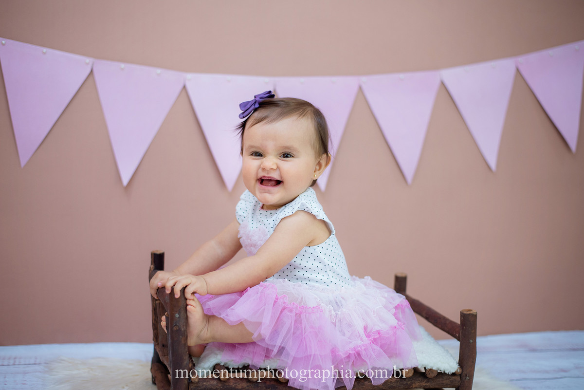 foto tirada por momentum photographia aniversario ensaio infantil em petropolis rj estudio 10 meses