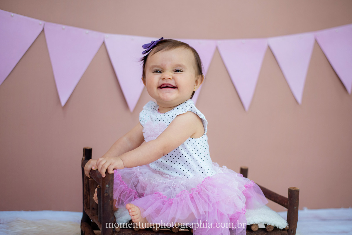 foto tirada por momentum photographia aniversario ensaio infantil em petropolis rj estudio 10 meses