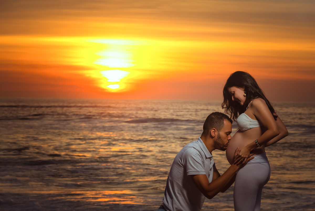 Ensaio externo na praia ao amanhecer