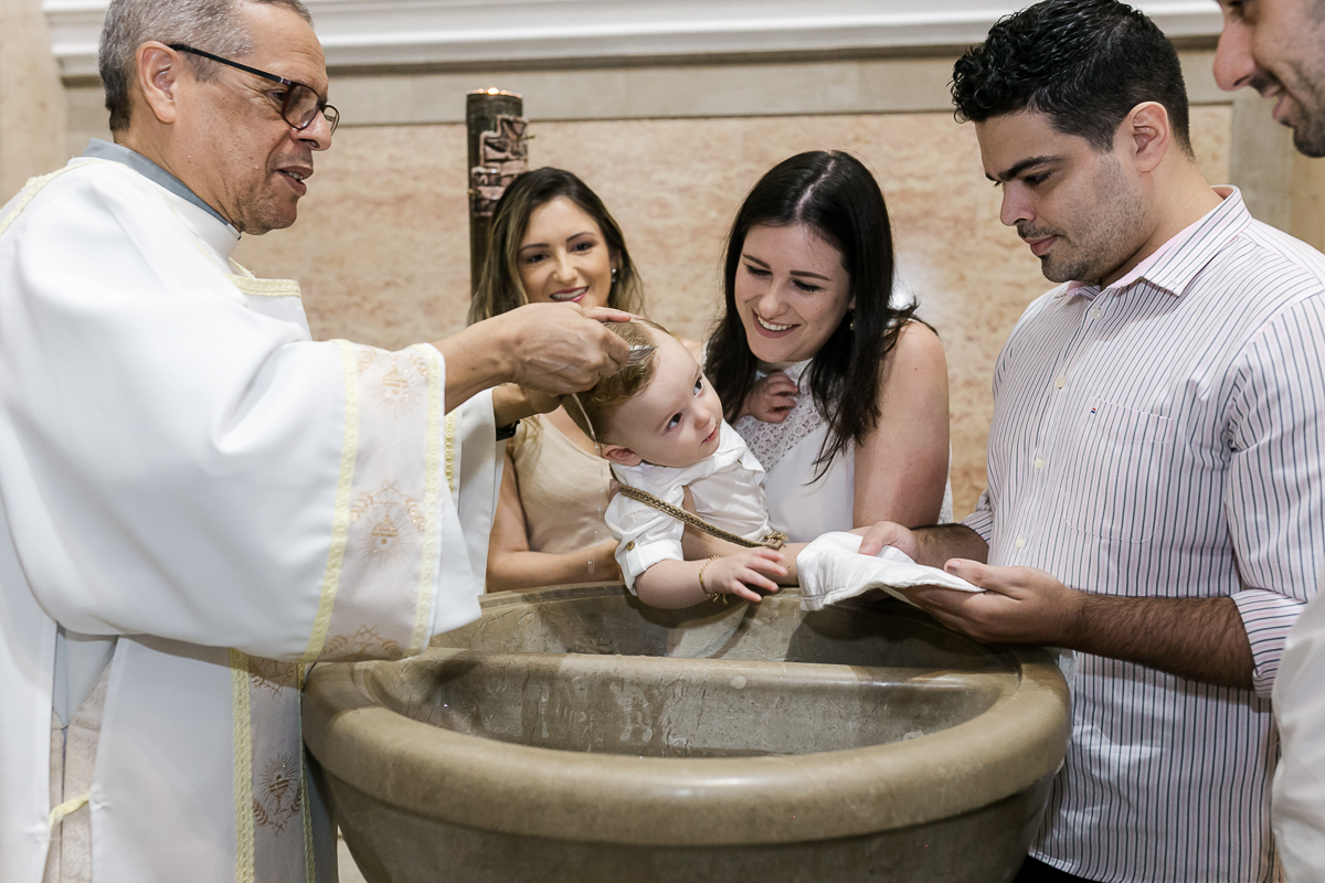 Padrinhos em batizado na paroquia  São Paulo Apostolo