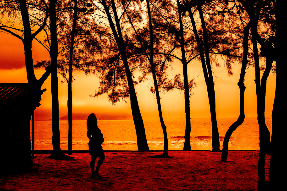 nascer do sol em ensaio fotográfico de  gestante-rj