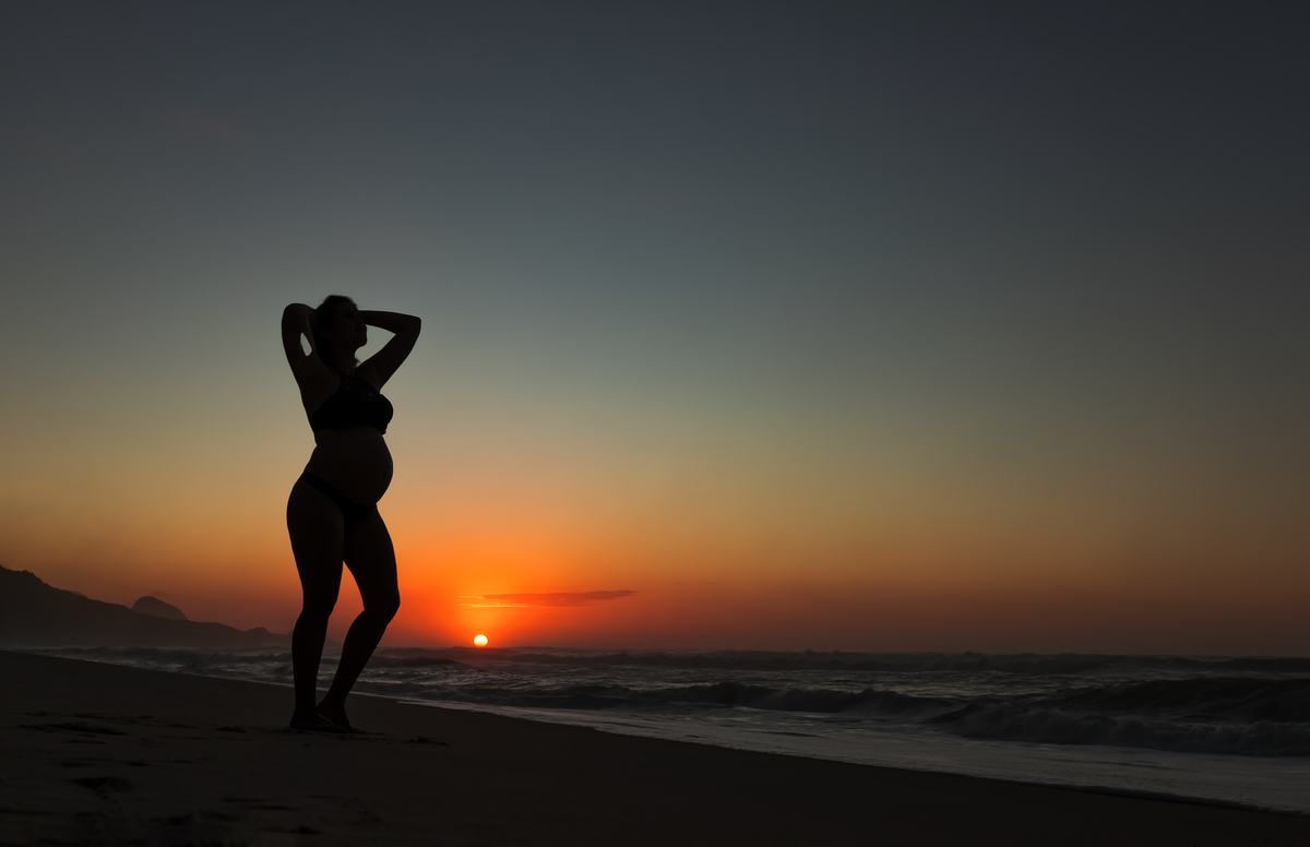 por do sol em ensaio de gestante 