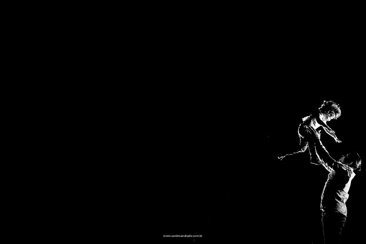 pai e filho, brincando ao anoitecer