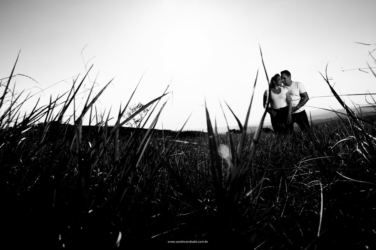 Fotografia de noivos no por do sol