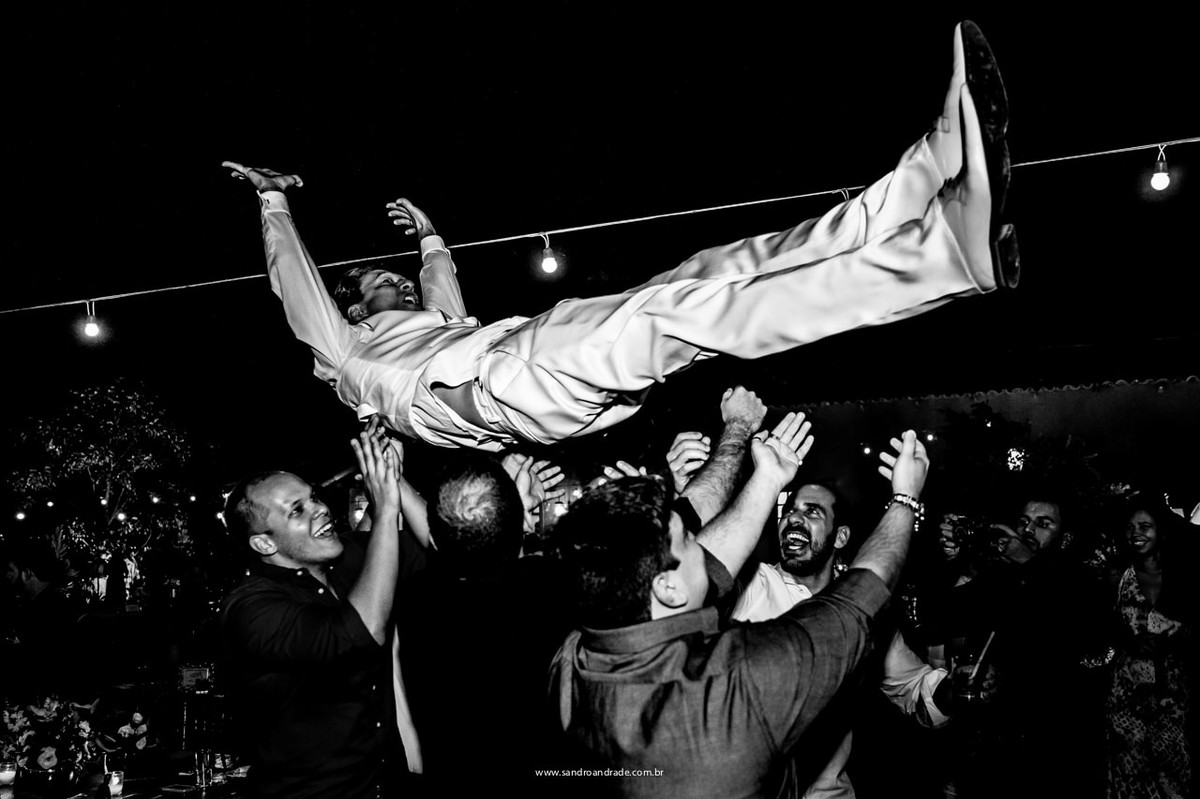 Fotografia criativa do noivo na festa