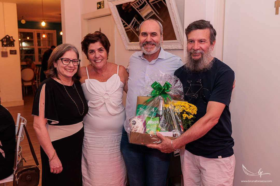 Bodas de Esmeralda, 40 anos de casamento, festa surpresa de bodas, comemoração de 40 anos, casal celebrando bodas, aniversário de casamento, fotógrafo de bodas, renovação de votos, celebração com família, evento emocionante