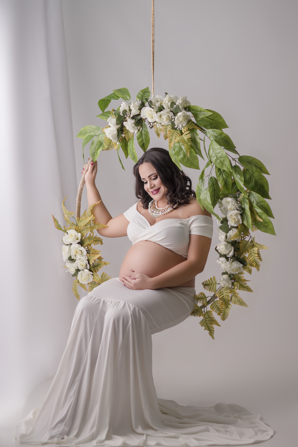 grávida balanço de flores