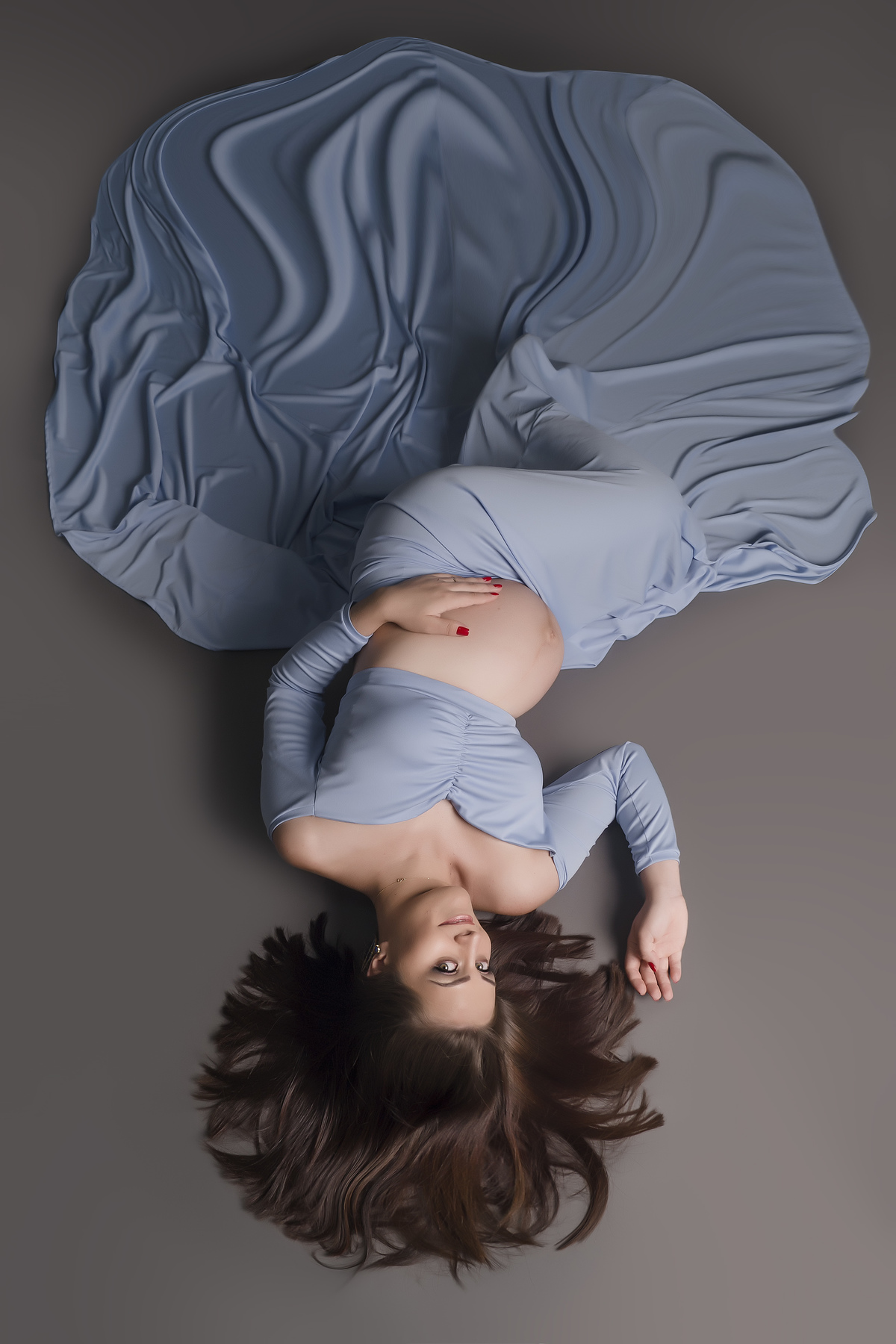 fotografia de gestante deitada