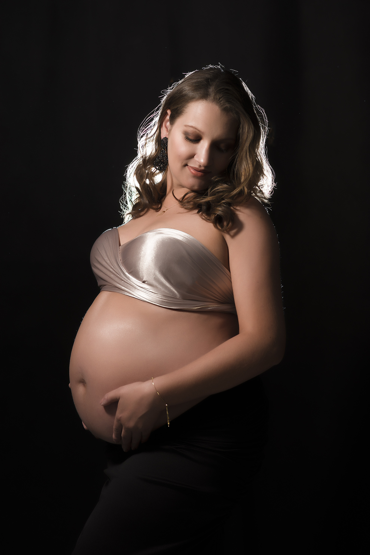 top dourado de gestante