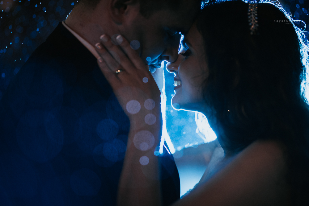 fotografia foto de casamento feito com casal na chuva em santos