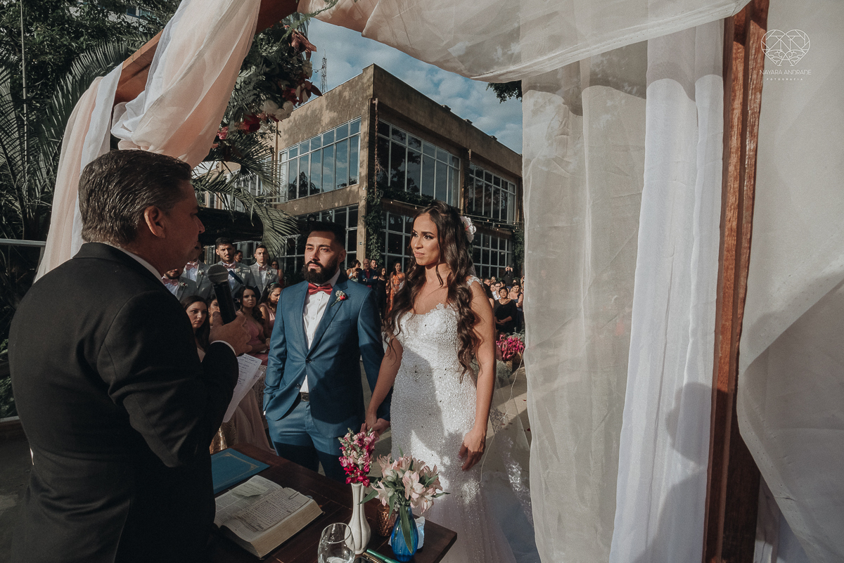 cerimonia de casamento ao ar livre com lindo por do sol no espaço plataforma em sao vicente santos no ilha porchat