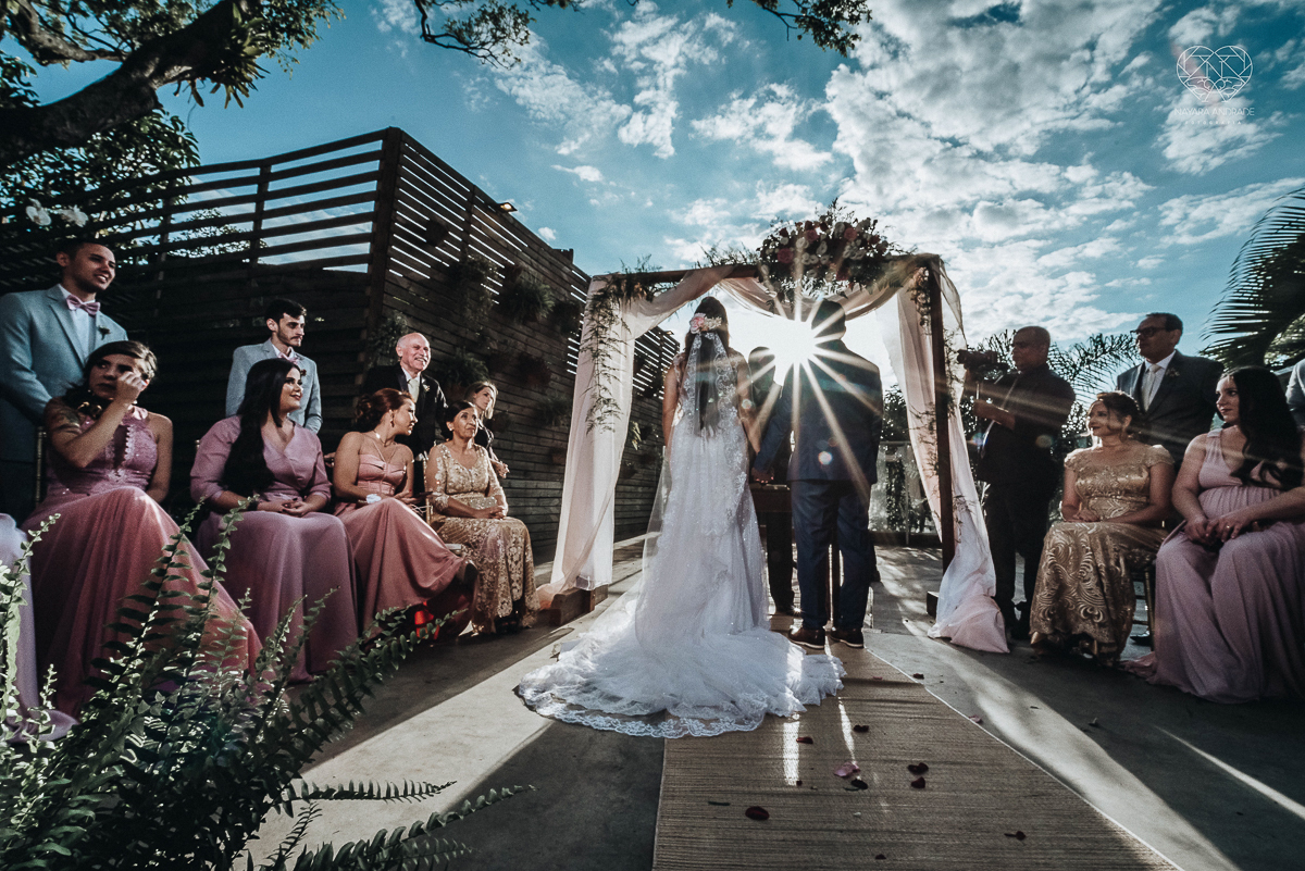 cerimonia de casamento ao ar livre com lindo por do sol no espaço plataforma em sao vicente santos no ilha porchat