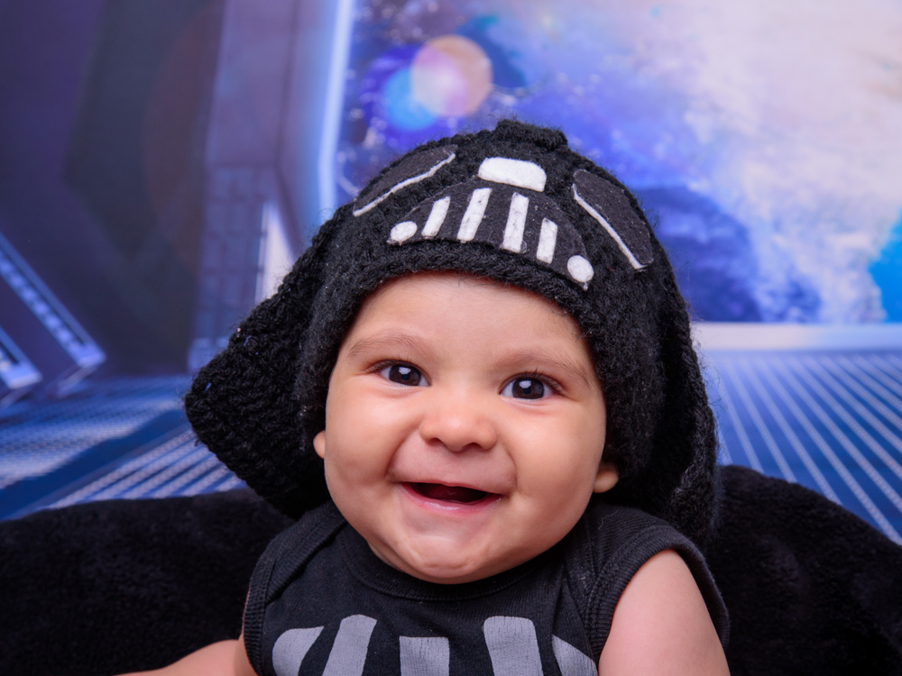 Sessão Aventura no Espaço, estrelas, espaço, aeronave, espada, touca, roupa de lã.