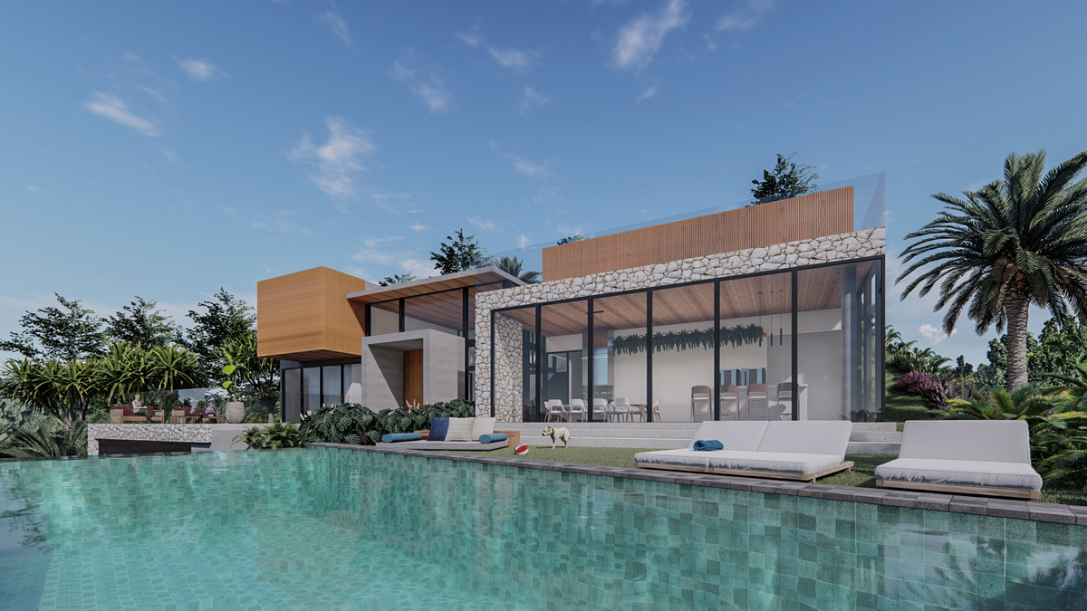 #ParaCegoVer: Piscina com pedra hijau, com gramado proximo onde possui um cachorro e a parede de pedra amoledo, vidros até o teto e madeira. Ao fundo vemos uma vegetação e o céu com poucas nuvens