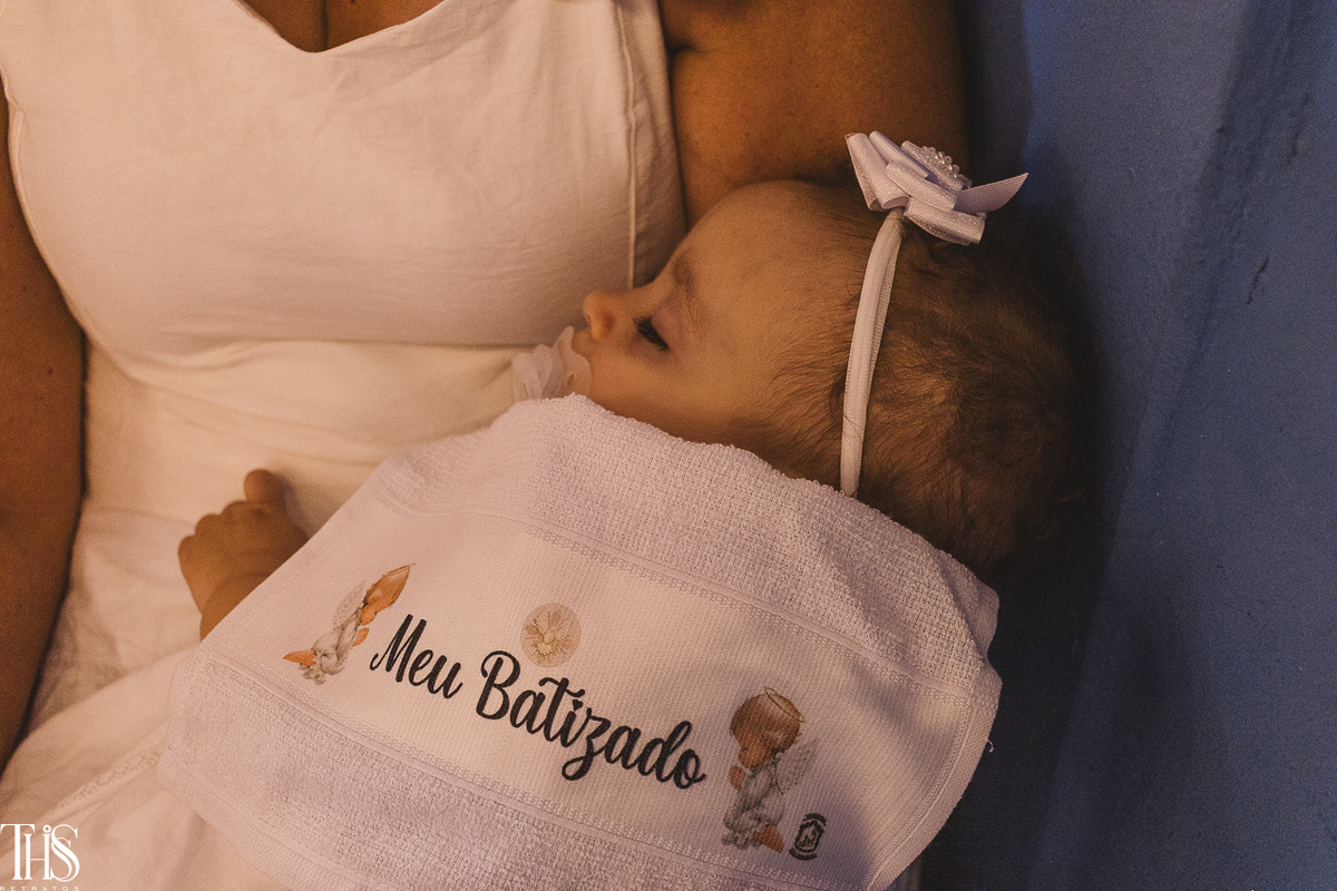 Bebê em batizado dormindo - Fotografa em SBC