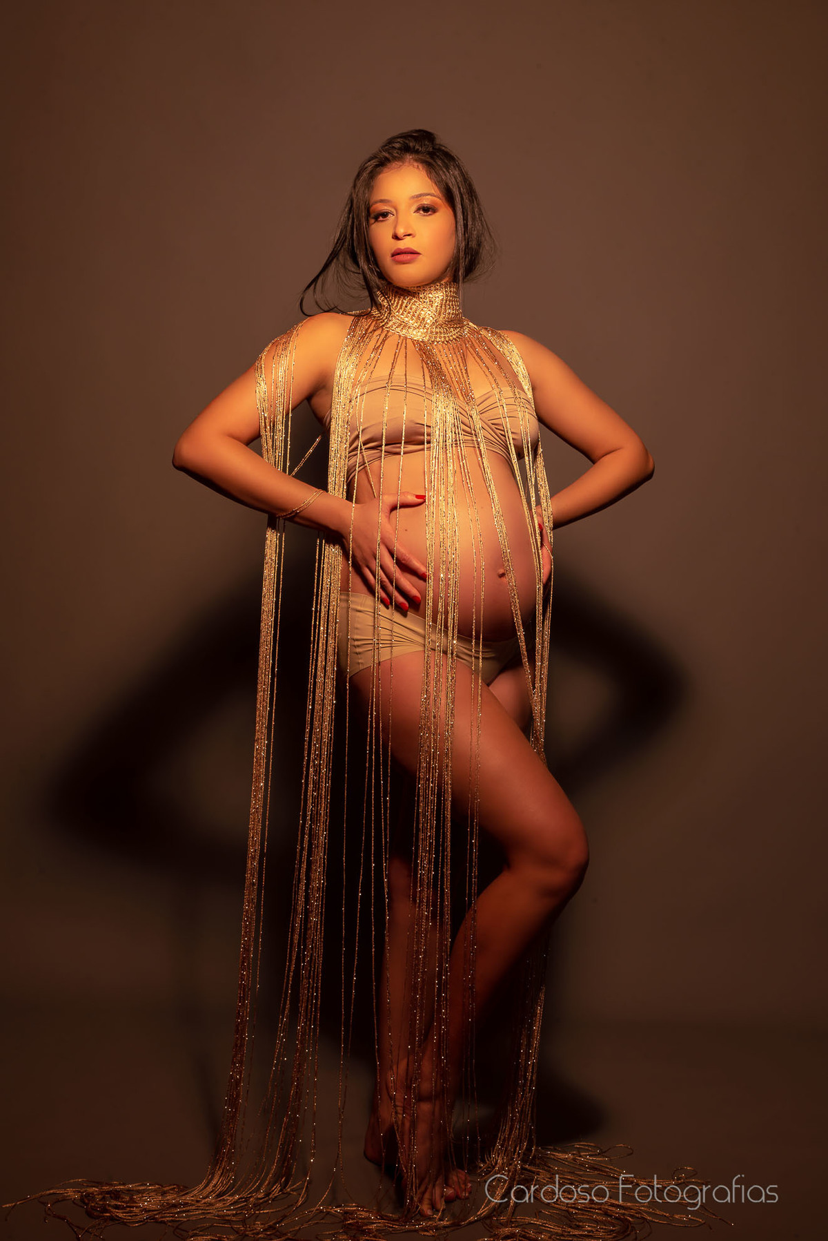 Glamour dourado gestante