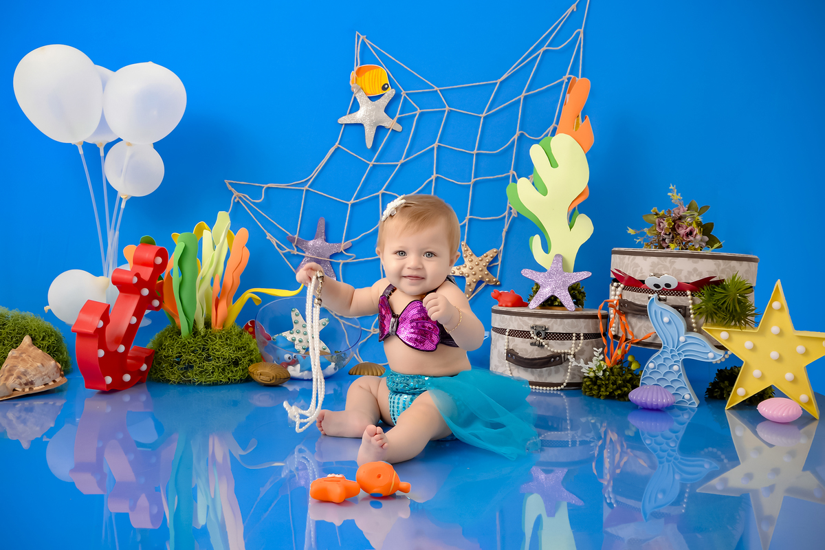 Drica Studio - Drica Studio fotografias - Drica Studio Xinguara Pará - acompanhamento mensal - fotos de bebe - cenário fundo do mar - azul - estrela - peixes - balões - ostras  