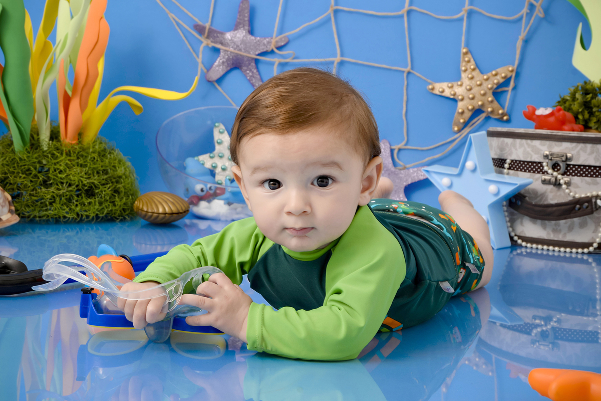 Drica Studio - Drica Studio fotografias - Drica Studio Xinguara Pará - acompanhamento mensal - fotos de bebe - cenário fundo do mar - azul - estrela do mar - âncora - cenário do mês - golfinho