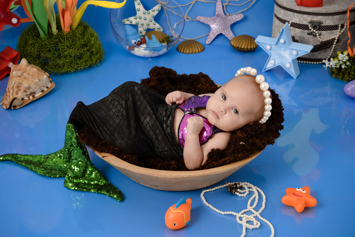 Drica Studio - Drica Studio fotografias - Drica Studio Xinguara Pará - acompanhamento mensal - fotos fundo do mar - bebe - azul - estrela - âncora - golfinho - sereia - peixes - perola 