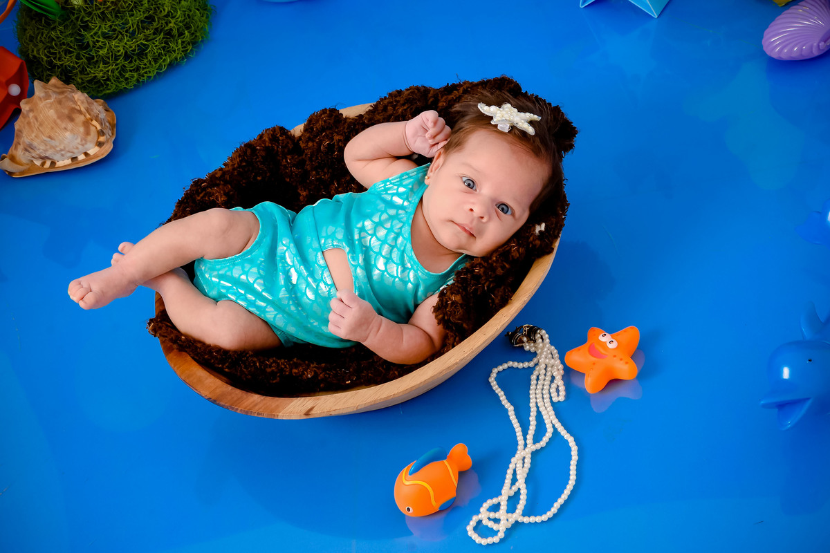 Drica Studio - Drica Studio fotografias - Drica Studio Xinguara Pará - acompanhamento mensal - fotos fundo do mar - bebe - azul - estrela - âncora - golfinho - sereia - peixes - perola - maiô 