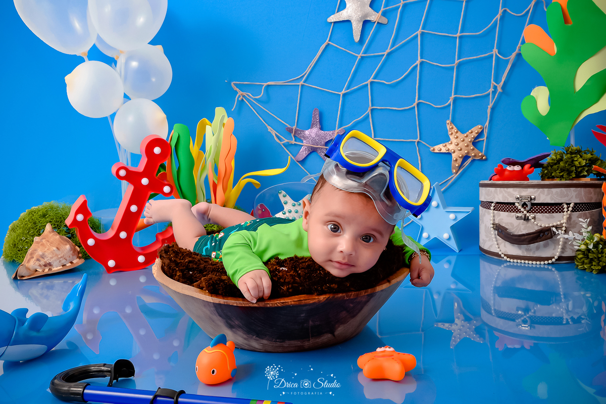 Drica Studio - Drica Studio fotografias - Drica Studio Xinguara Pará - acompanhamento mensal - fotos de bebe - cenário fundo do mar - azul - estrela do mar - âncora - cenário do mês 