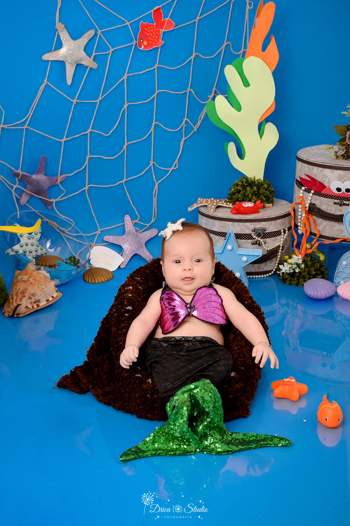 Drica Studio - Drica Studio fotografias - Drica Studio Xinguara Pará - acompanhamento mensal - fotos fundo do mar - bebe - azul - estrela - âncora - golfinho - sereia - peixes - ostras 