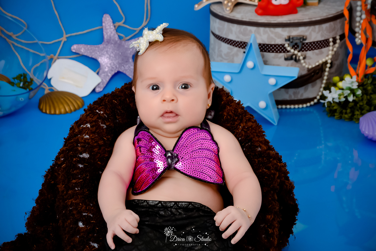 Drica Studio - Drica Studio fotografias - Drica Studio Xinguara Pará - acompanhamento mensal - fotos fundo do mar - bebe - azul - estrela - âncora - golfinho - sereia - peixes - perola 
