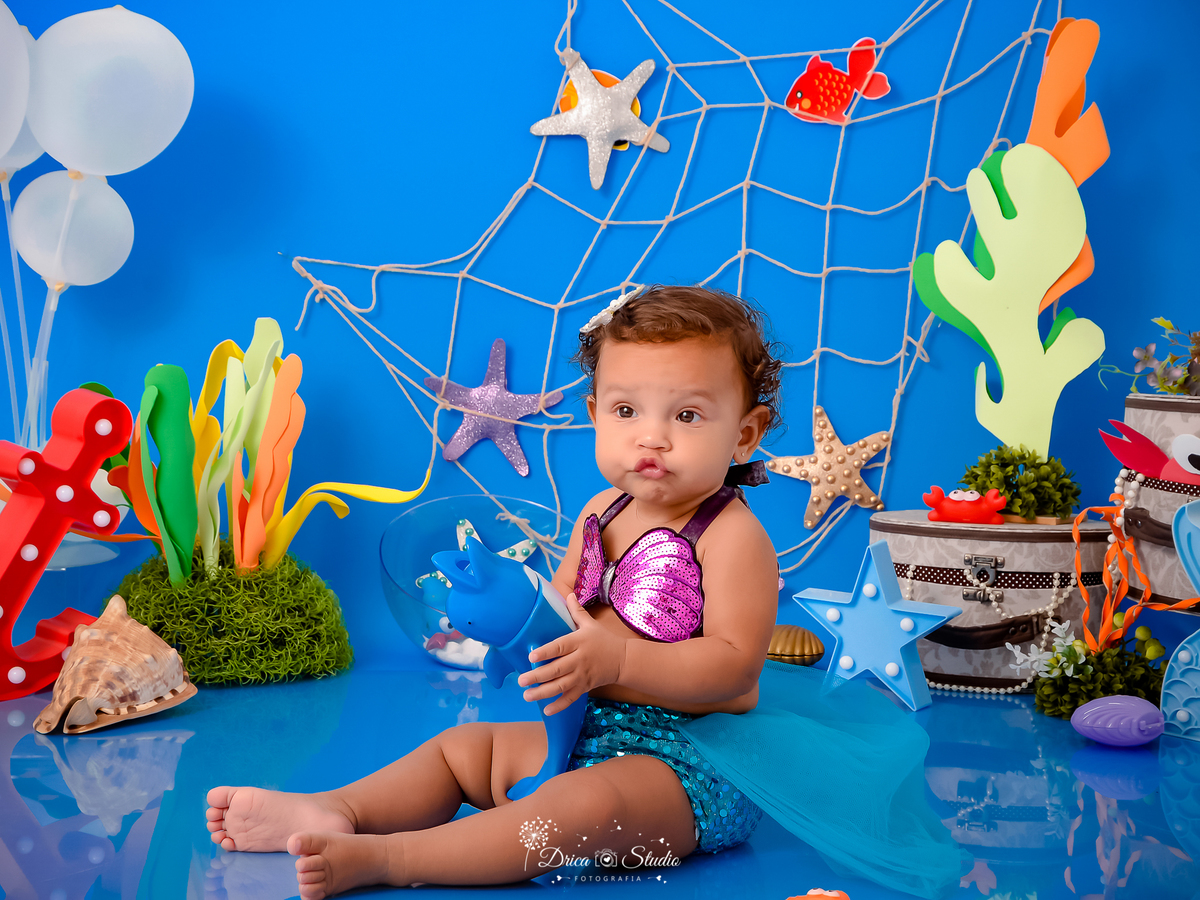 Drica Studio - Drica Studio fotografias - Drica Studio Xinguara Pará - acompanhamento mensal - fotos de bebe - cenário fundo do mar - azul - estrela - peixes - balões - ostras  