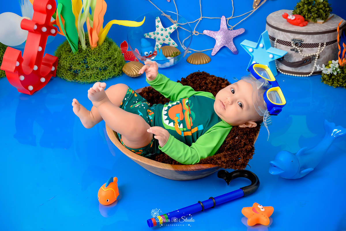 Drica Studio - Drica Studio fotografias - Drica Studio Xinguara Pará - acompanhamento mensal - fotos de bebe - cenário fundo do mar - azul - estrela do mar - âncora - cenário do mês - golfinho 