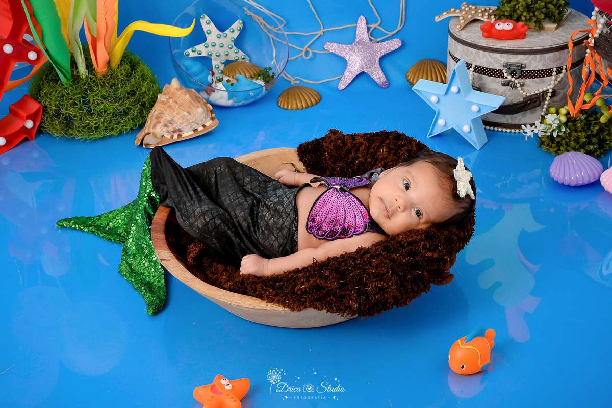 Drica Studio - Drica Studio fotografias - Drica Studio Xinguara Pará - acompanhamento mensal - fotos fundo do mar - bebe - azul - estrela - âncora - golfinho - sereia - peixes - perola 