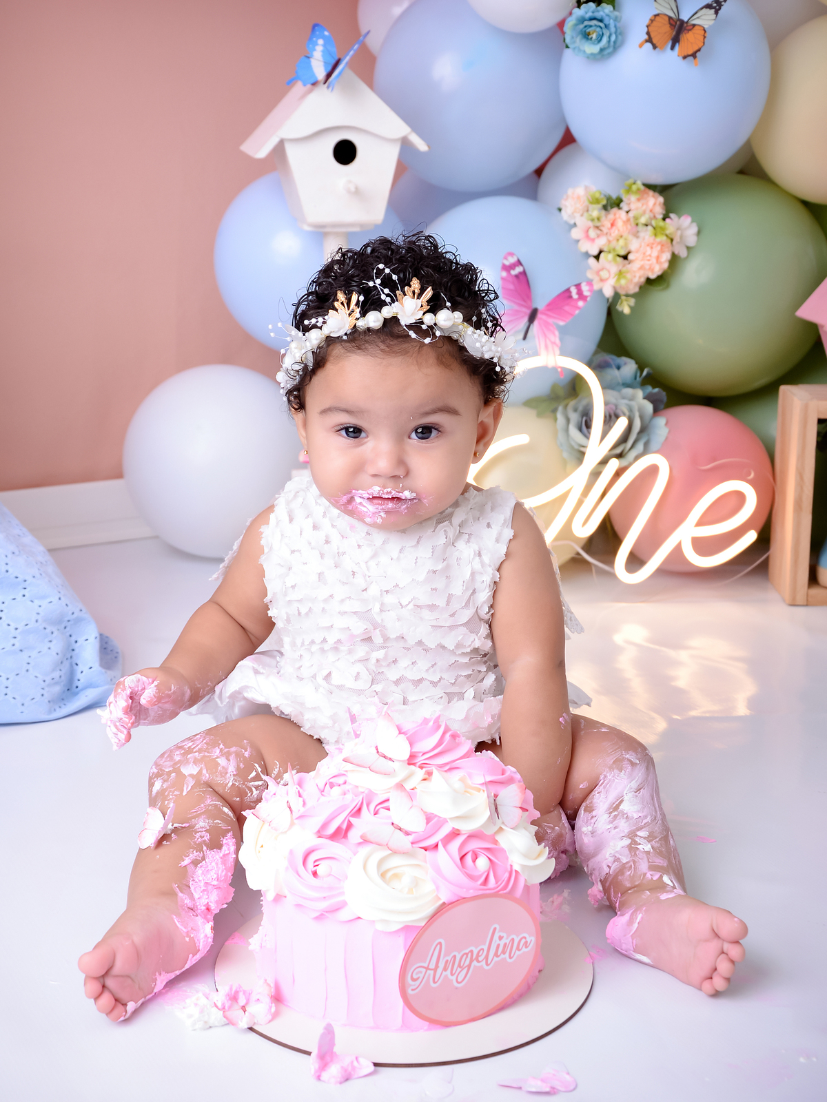 Drica studio - jardim encantado - jardim das borboletas -comendo bolo - bolo rosa - smash the cake - xinguara - ensaio fotográfico