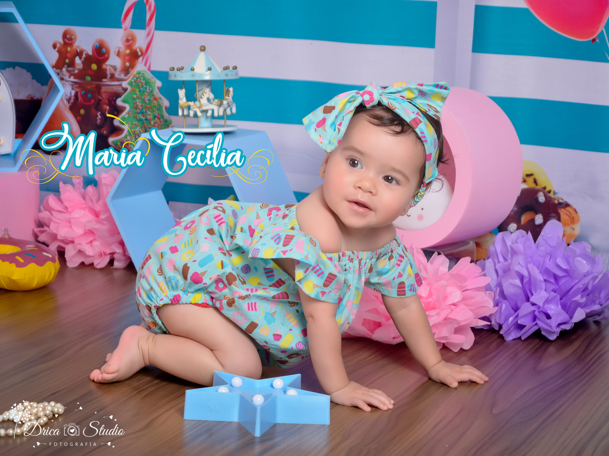 Ensaio infantil-cenário doce-colorido- divertido-docinho da mamãe-gostosura-Body docinho-Book infantil-acompanhamento-felicidade- carrossel -rosa e azul-criança-estúdio infantil- Fotografa de família-Fotografa em Xinguara- Drica Studio Fotografia-Pará.
