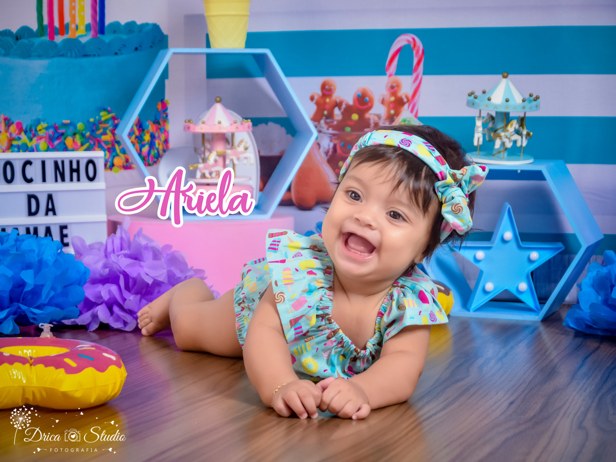 Ensaio infantil-cenário doce-gostoso-colorido- divertido-docinho da mamãe-Book infantil-acompanhamento-felicidade- Ariela-rosa e azul-criança-estúdio infantil- Fotografa de família-Fotografa em Xinguara- Drica Studio Fotografia-Pará.