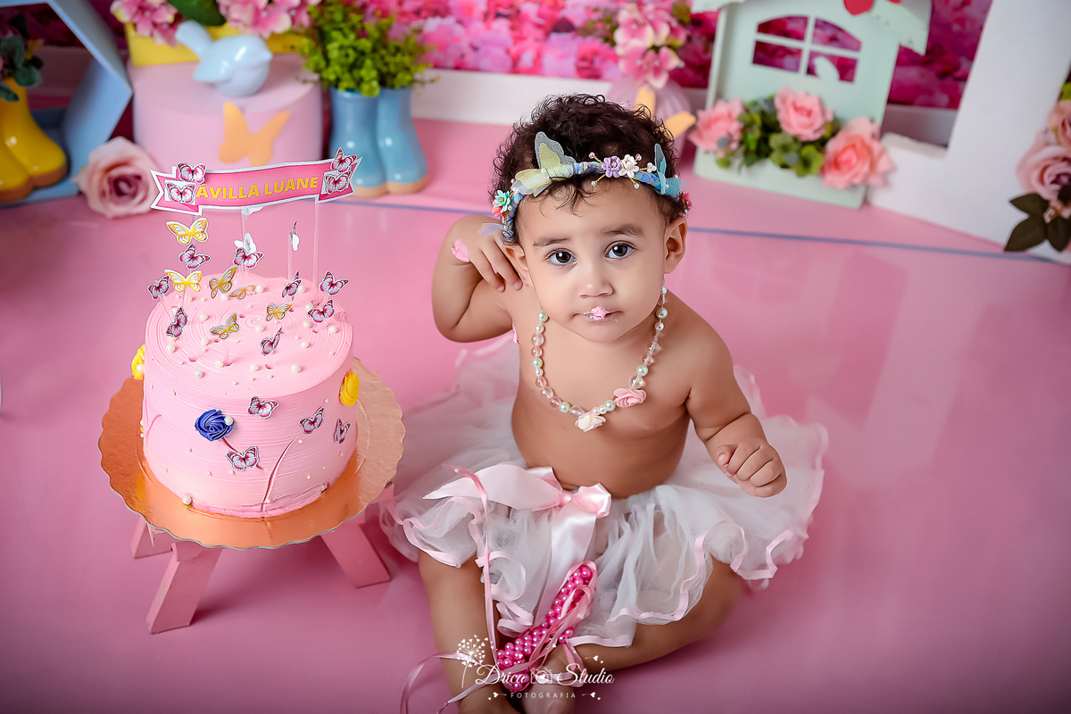 smash de cake - jardim encantado - fotos em cenário infantil - fotos em estúdio - meu mundo rosa - fotos 1 ano - tema de aniversario - fotos infantis - menina - cenário de borboleta - Drica stúdio - Xinguara - Pará