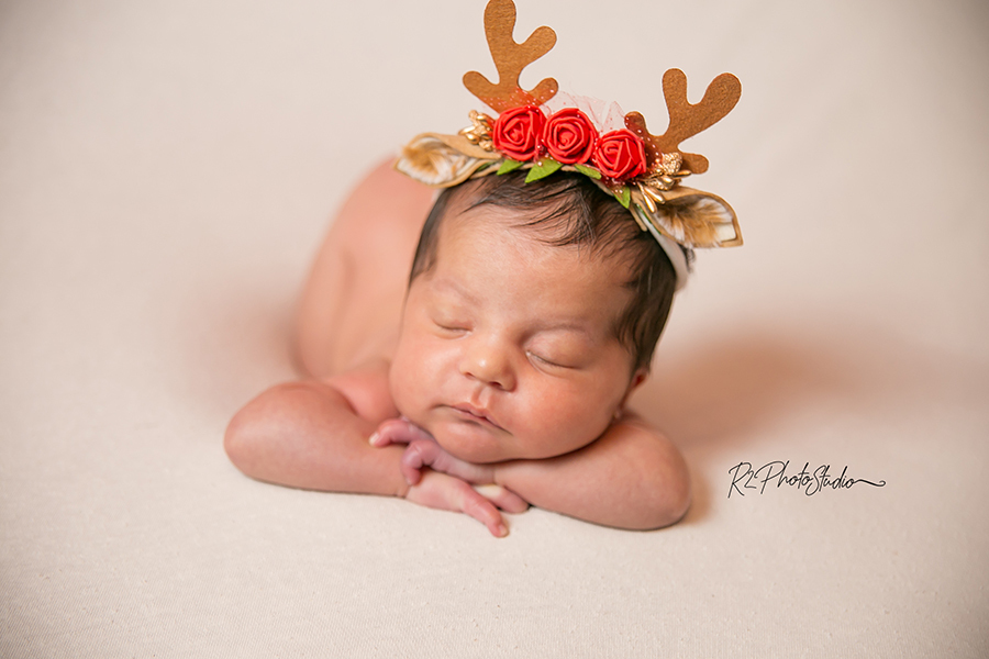 Foto de Bebe menina com headband de alce