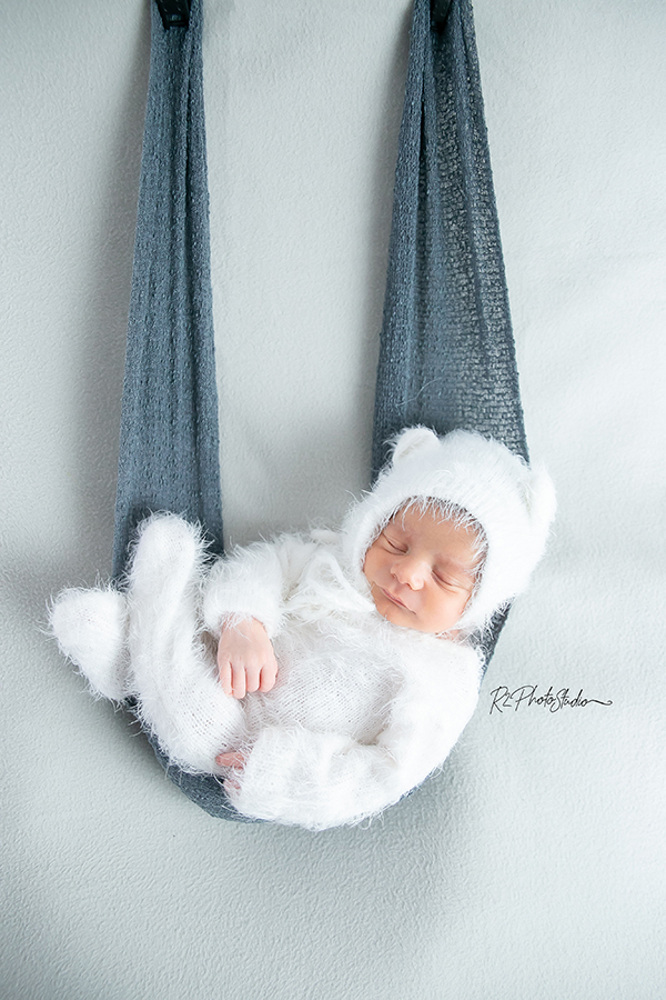 foto de bebe no saco da cegonha