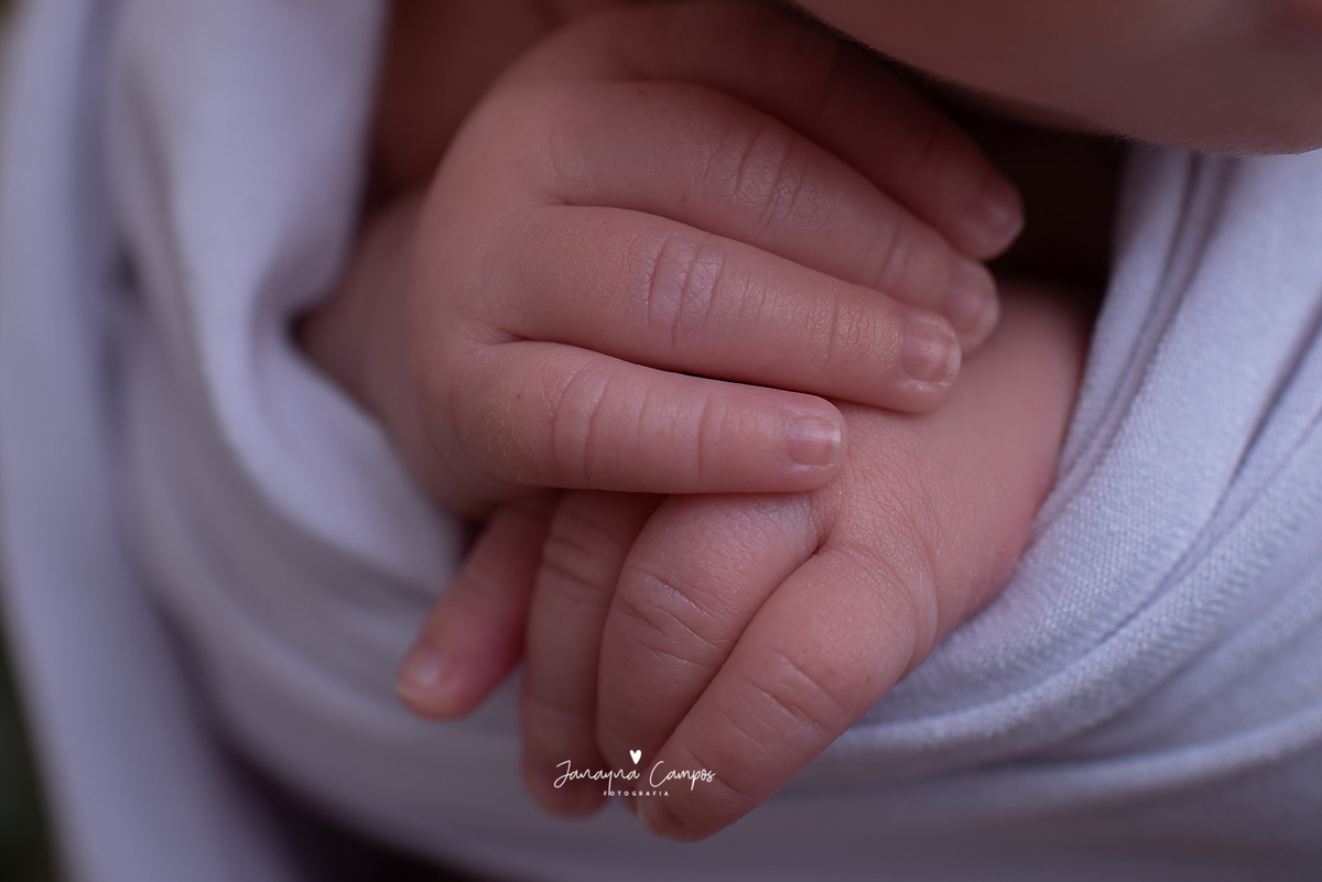 Newborn detalhes mãos
