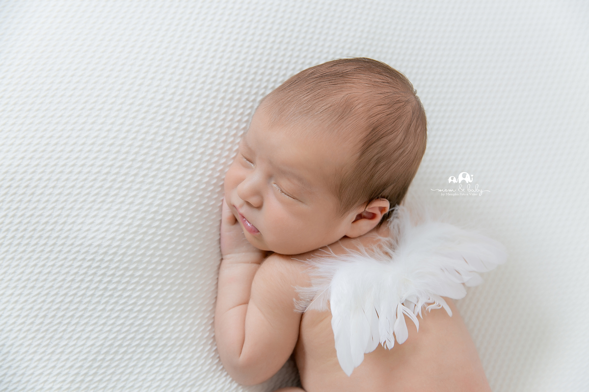 ensaio Newborn em santos,fotografas de santos,bebes de santos,estudio fotografico em santos,segurança,especialistas em newborn em santos,melhores fotografas de newborn em santos,jo farah leticia farah,manda branca,pose de bundinha,mini asinha de anjo,