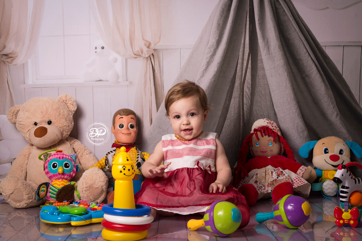 Acompanhamento mensal bebê, fotografia de bebês, fotógrafo de bebês, fotógrafo newborn, estúdio fotográfico de bebês, estúdio fotográfico de família, fotos de família. quarto de brinquedos