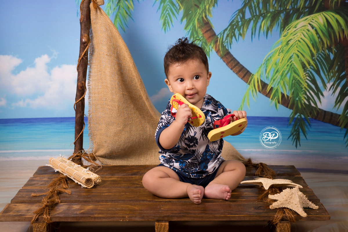 Ensaio Praia/verão de menino feitono estúdio Danilo Pinezi Fotografia em Bariri/SP