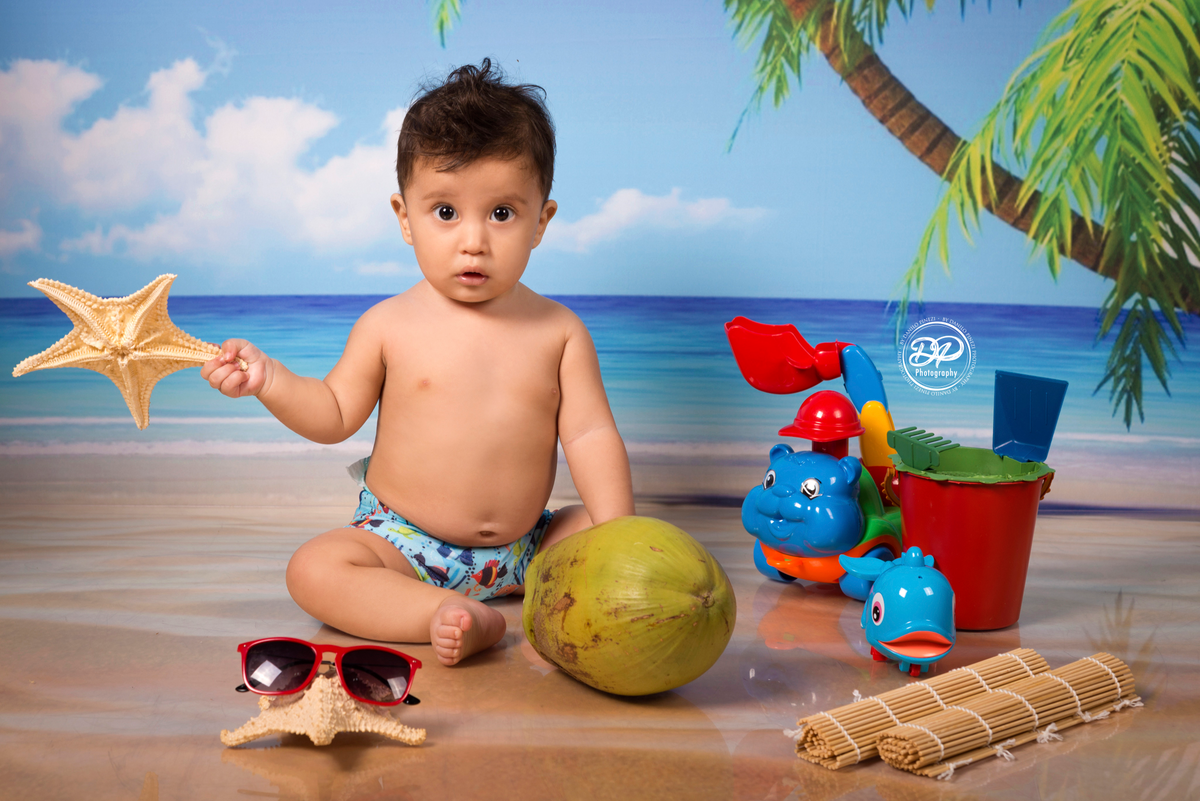 Ensaio Praia/verão de menino feitono estúdio Danilo Pinezi Fotografia em Bariri/SP