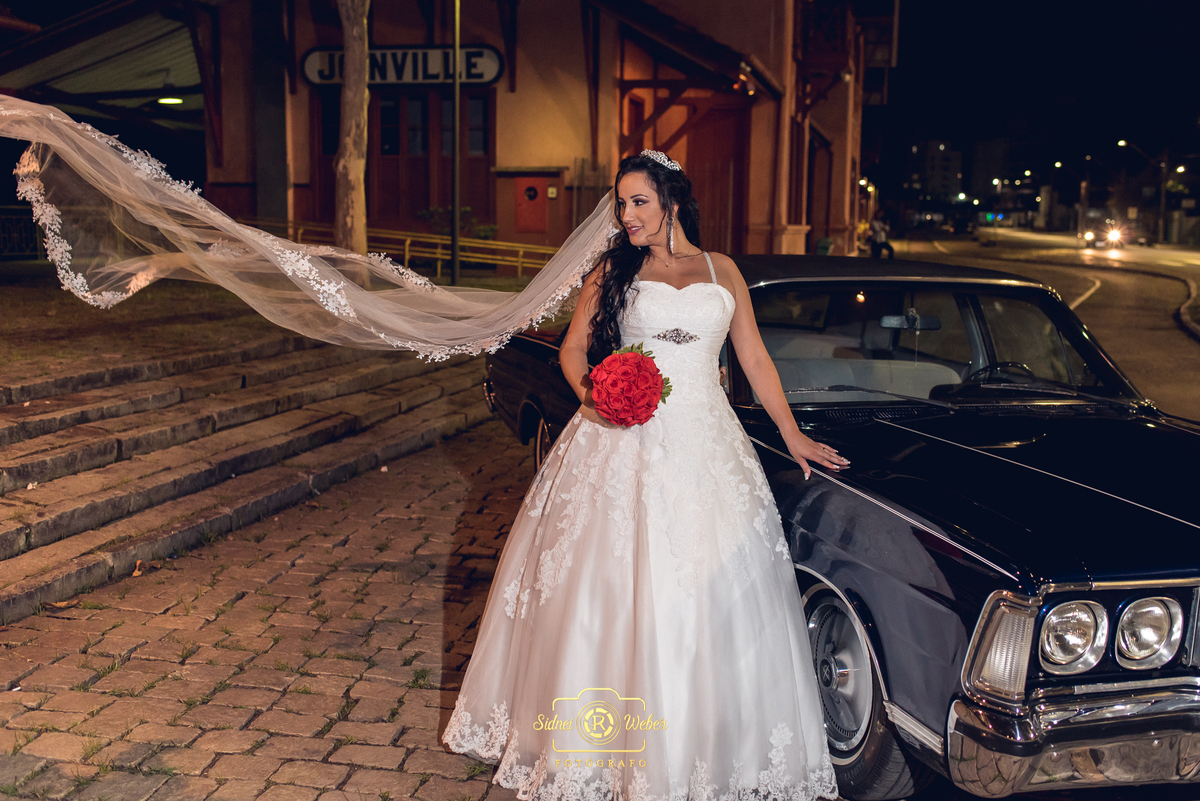 Clássica foto da noiva e o veú