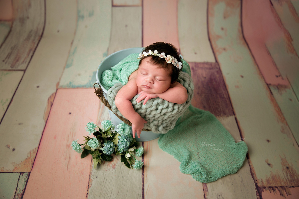 pose bracinho para fora newborn