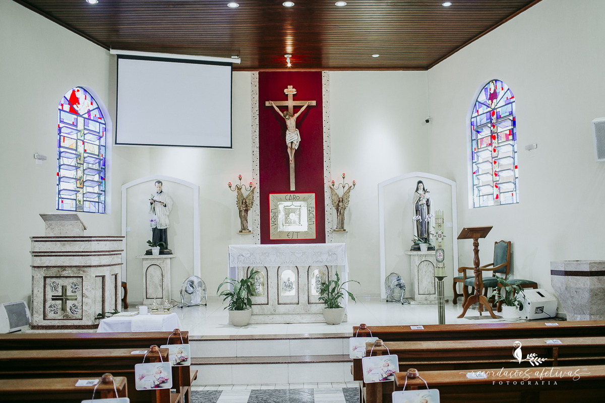 Batizado católico realizado na Paróquia São Luiz Gonzaga, em São Roque