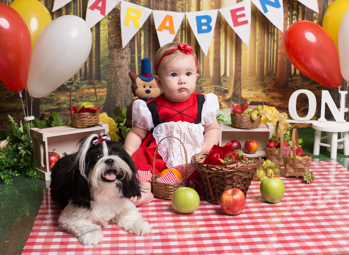 Ensaio de criança com pet. O nome dela é Nina e acompanha a família em tudo.
