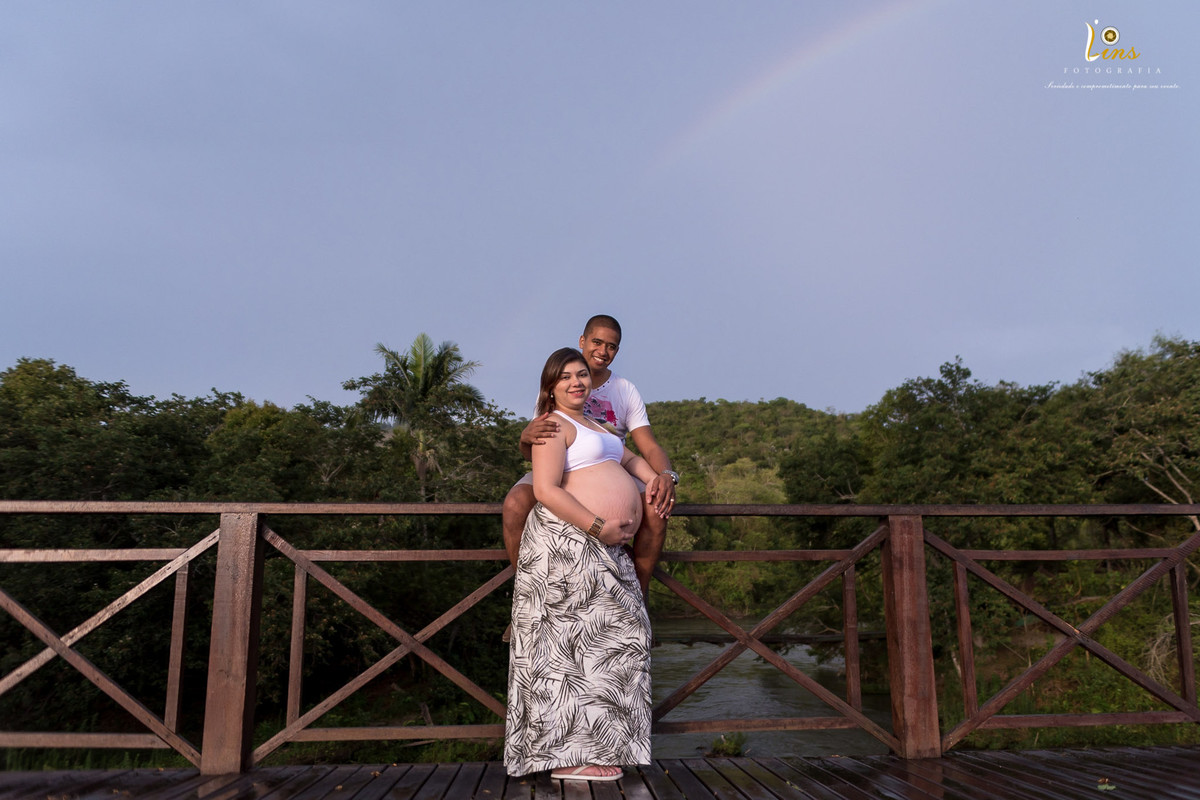 por do sul e arco íris no ensaio de gestante